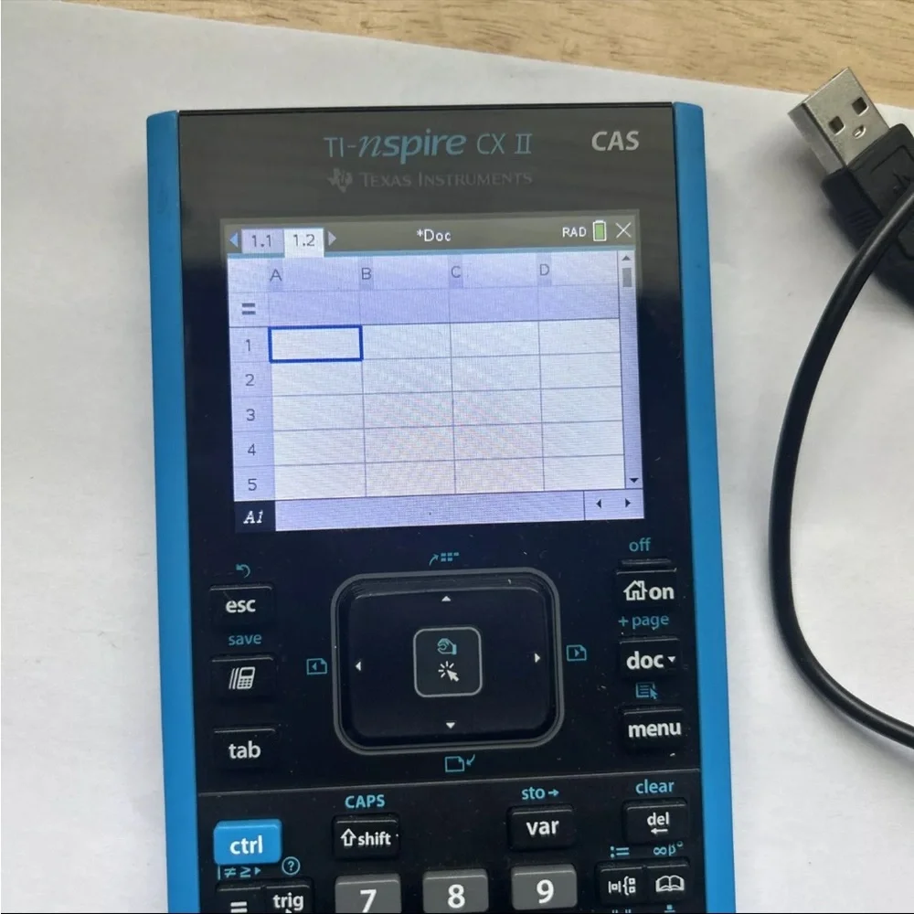 Texas Instruments TI Nspire CX II CAS Graphing Calculator with charger USB cable